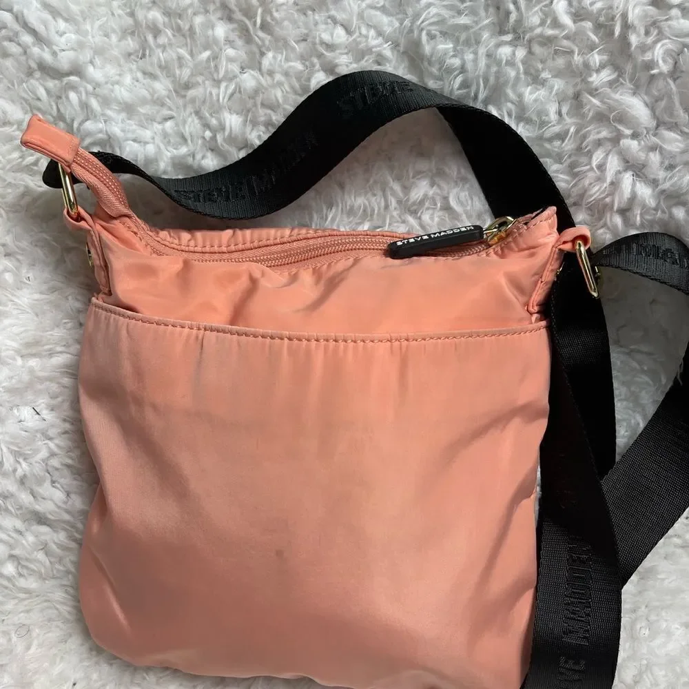 Steve Madden peach quilted nylon front zipper pocket shoulder/crossbody bag.